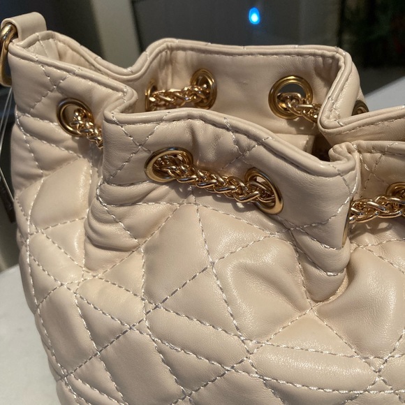 Quilted Mini Satchel Cream vegan leather. Gold-tone accents with a Tassel pull - Picture 2 of 8
